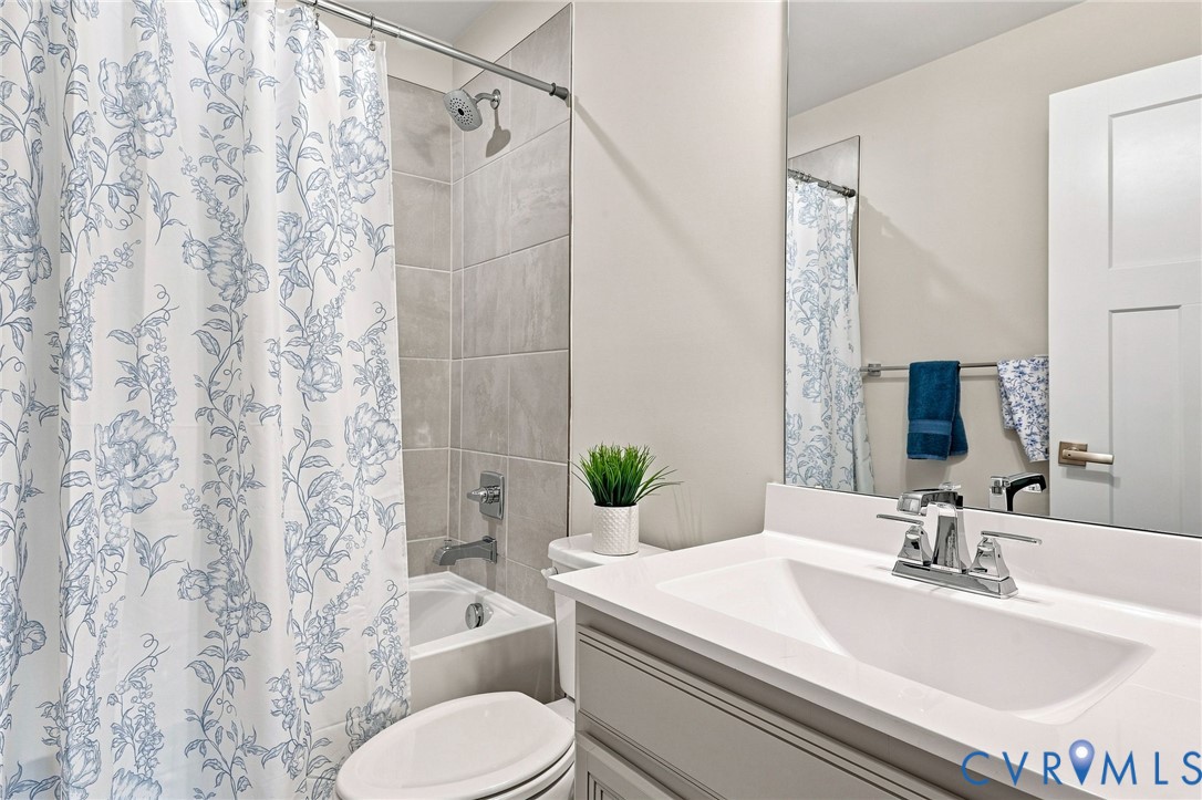 Hall Bathroom:  Tub with Tiled Surround