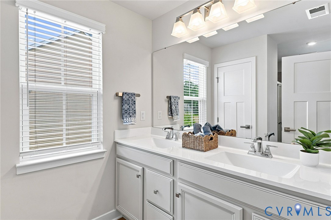 Dual Sink Vanity, Linen Closet Within the Bathroom