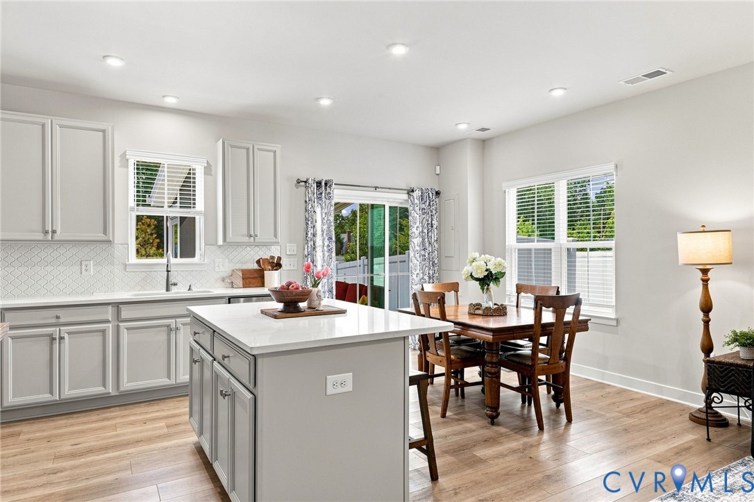 Dining area with screened porch beyond Dining area with screened porch beyond