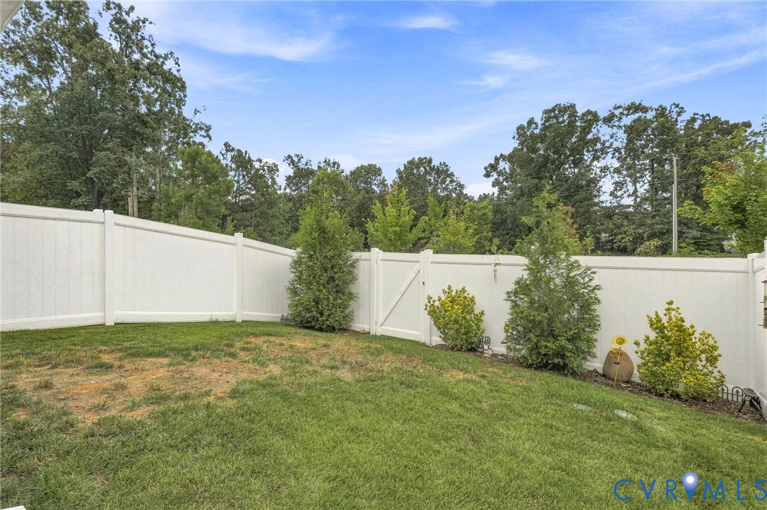 Fenced Backyard - yard taken care of courtesy of HOA