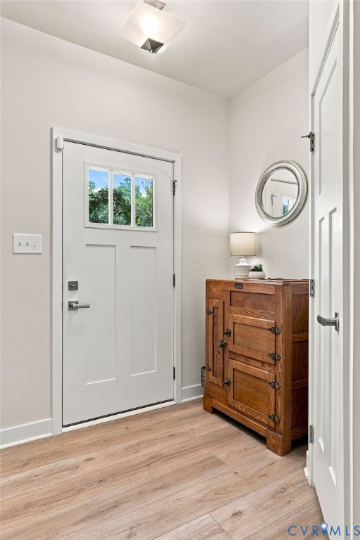 Coat closet, entry way, woodgrain LVP throughout first floor. Coat closet, entry way, woodgrain LVP throughout first floor.
