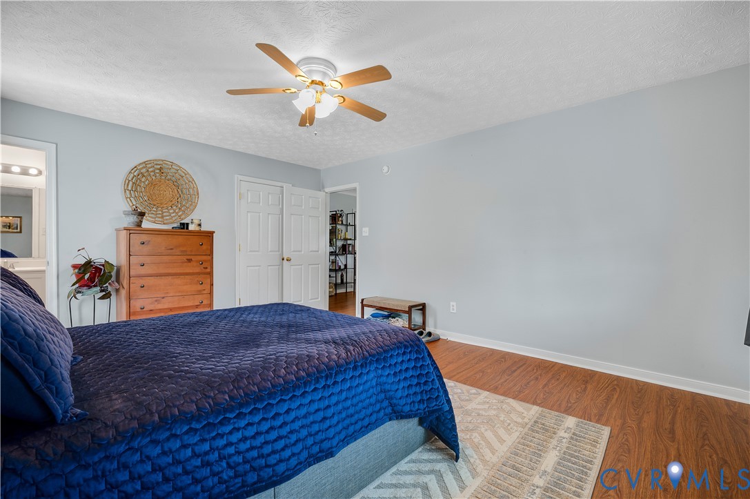 Primary Bedroom, Wood-finish flooring throughout