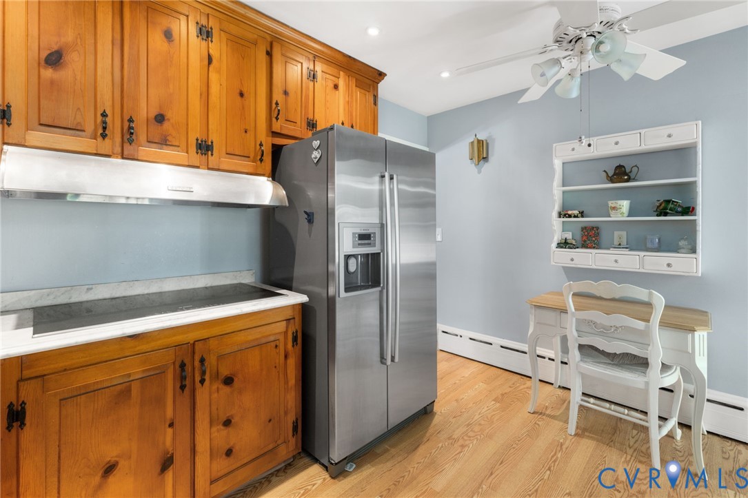 Wood-finish flooring with light blue wall paint