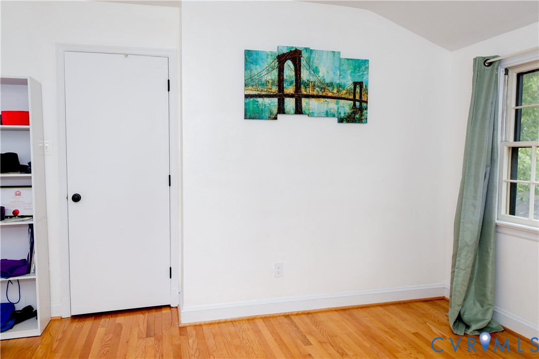 Third bedroom or office w/ Hardwood floors.