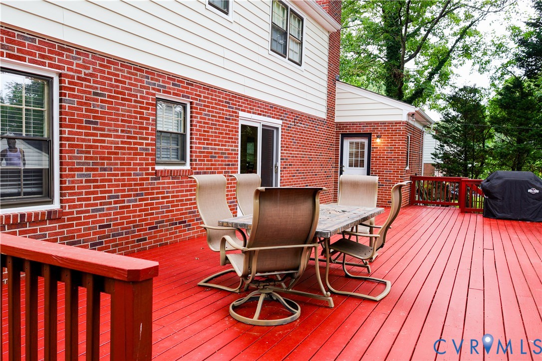 Spacious outdoor deck for relaxing or entertaining.