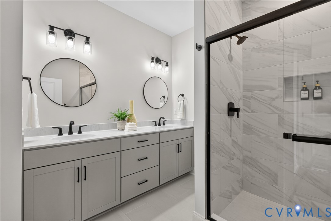Dual sink vanity with light gray cabinetry