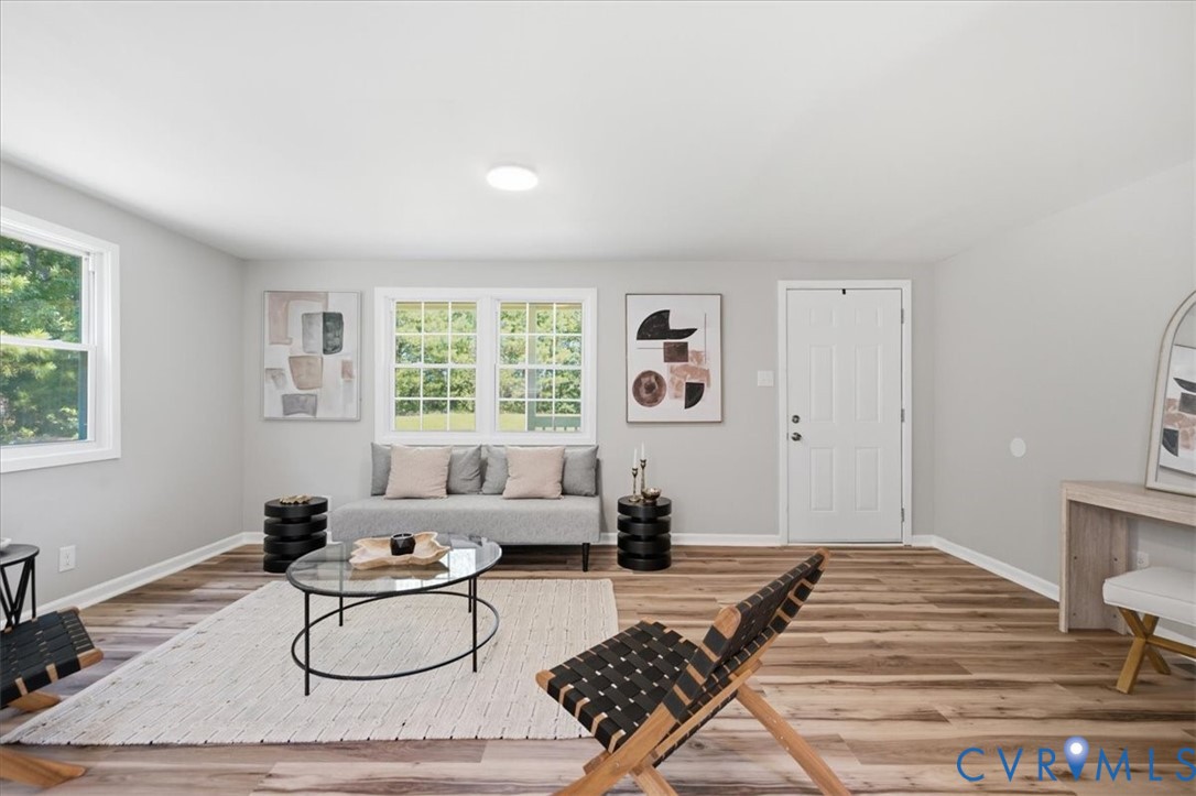 Light gray interior walls with wood-finish flooring
