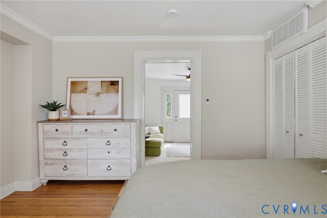 Hardwood flooring, crown molding, access to 3rd bedroom/flex room