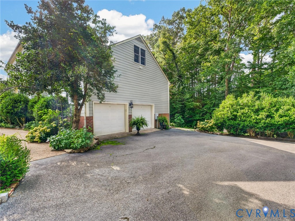 Paved and oversized driveway and parking area!