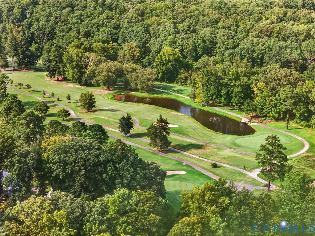 Nearby golf hole to the rear of this home