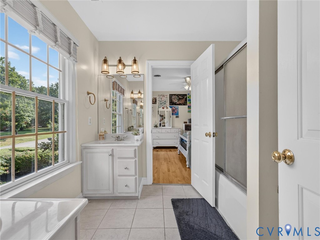 Tile floor and enclosed tub/shower
