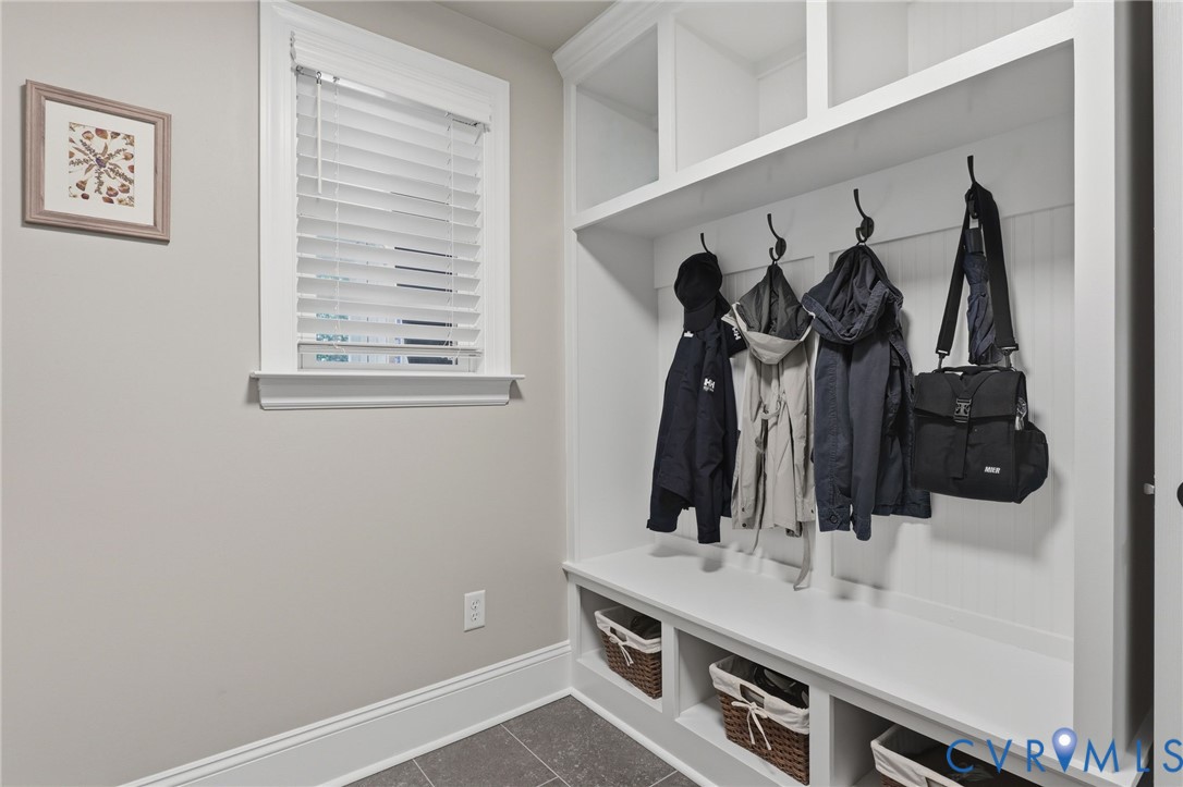 off the attached garage making is a convenient drop zone.