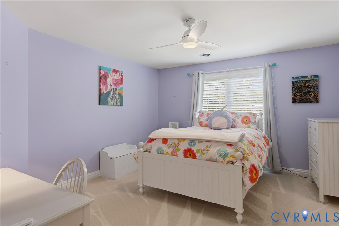 This bedroom features direct access to a full private bath on the second floor