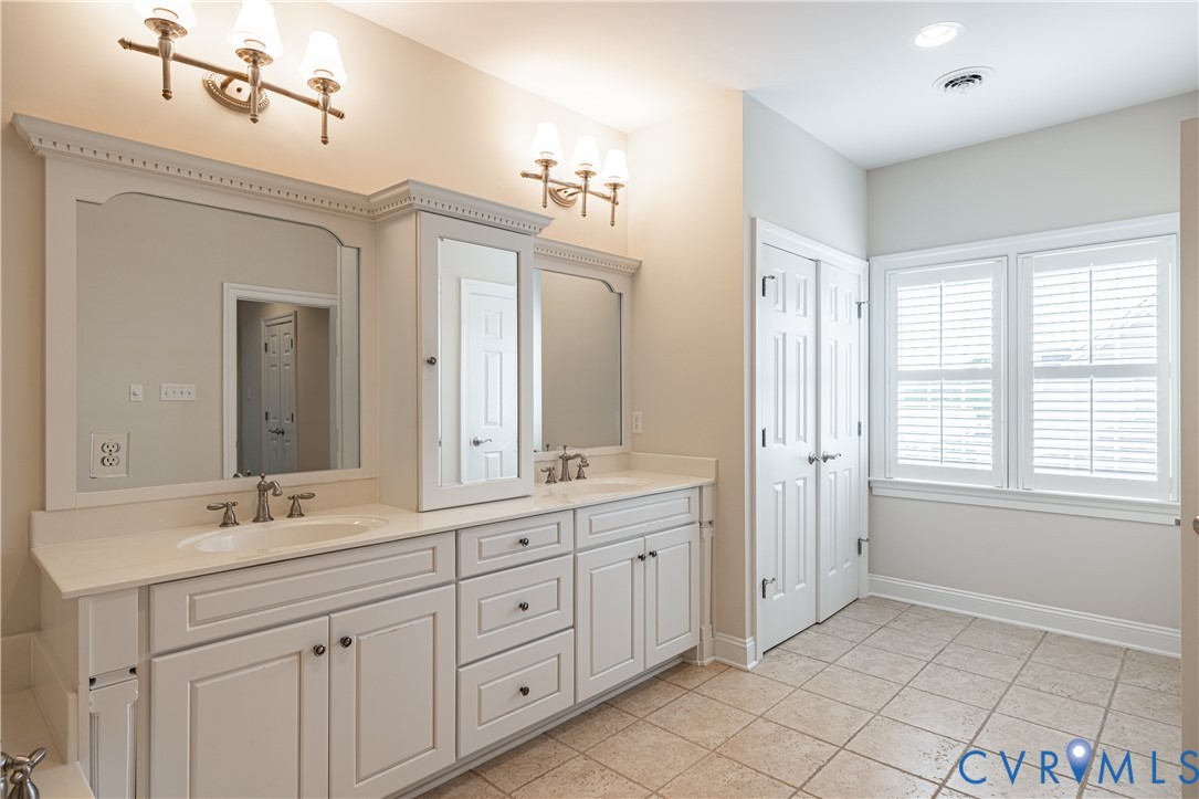 Primary bath with furniture style vanity