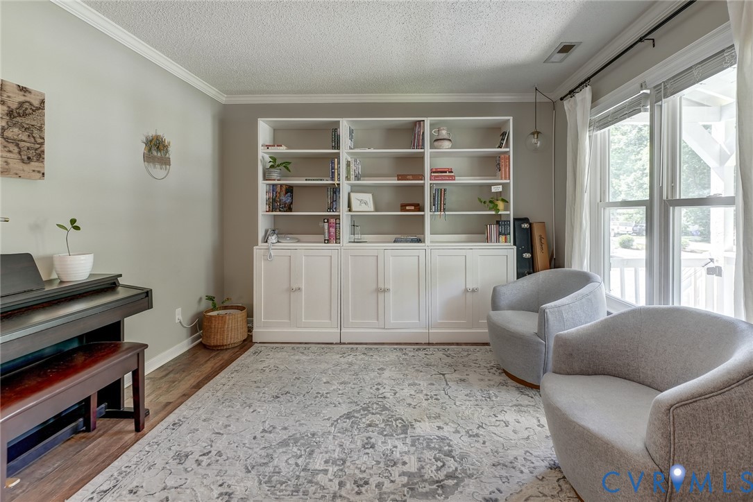 Custom built-in white cabinetry with open shelving
