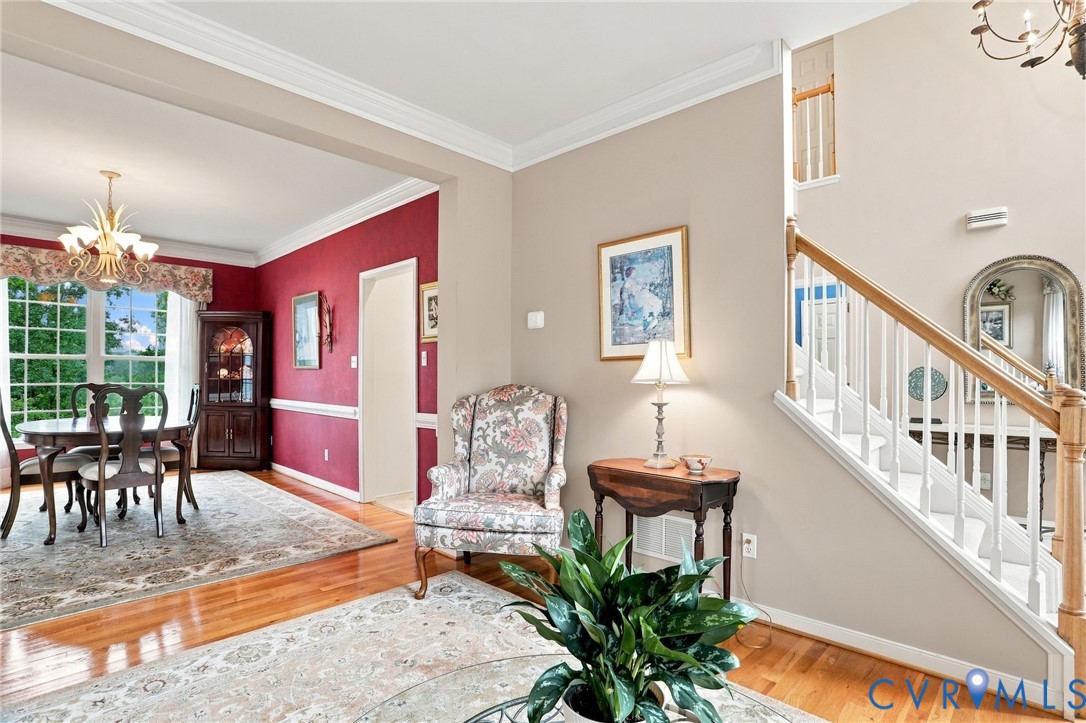 Open sightlines between the living and dining rooms create an inviting flow for everyday living and entertaining.