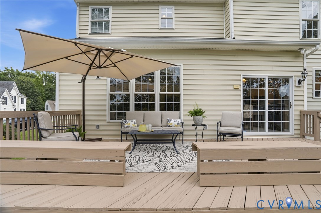 Expansive rear deck creates a wonderful outdoor living and entertaining space with easy access from the home.