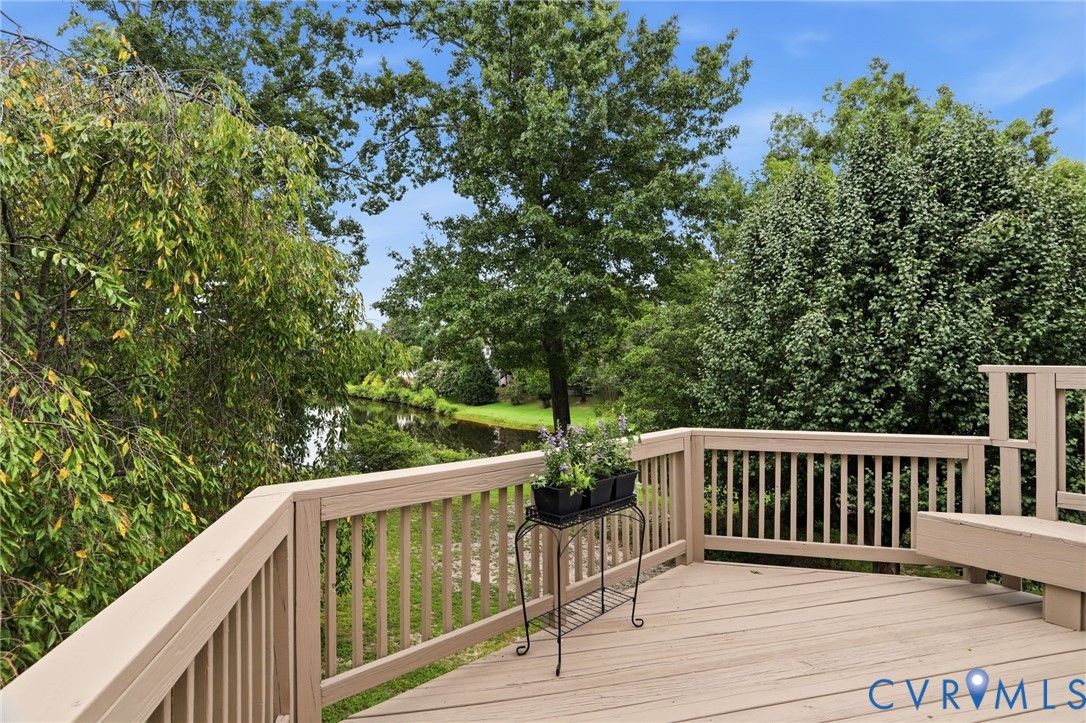 Enjoy peaceful water views and mature landscaping.
