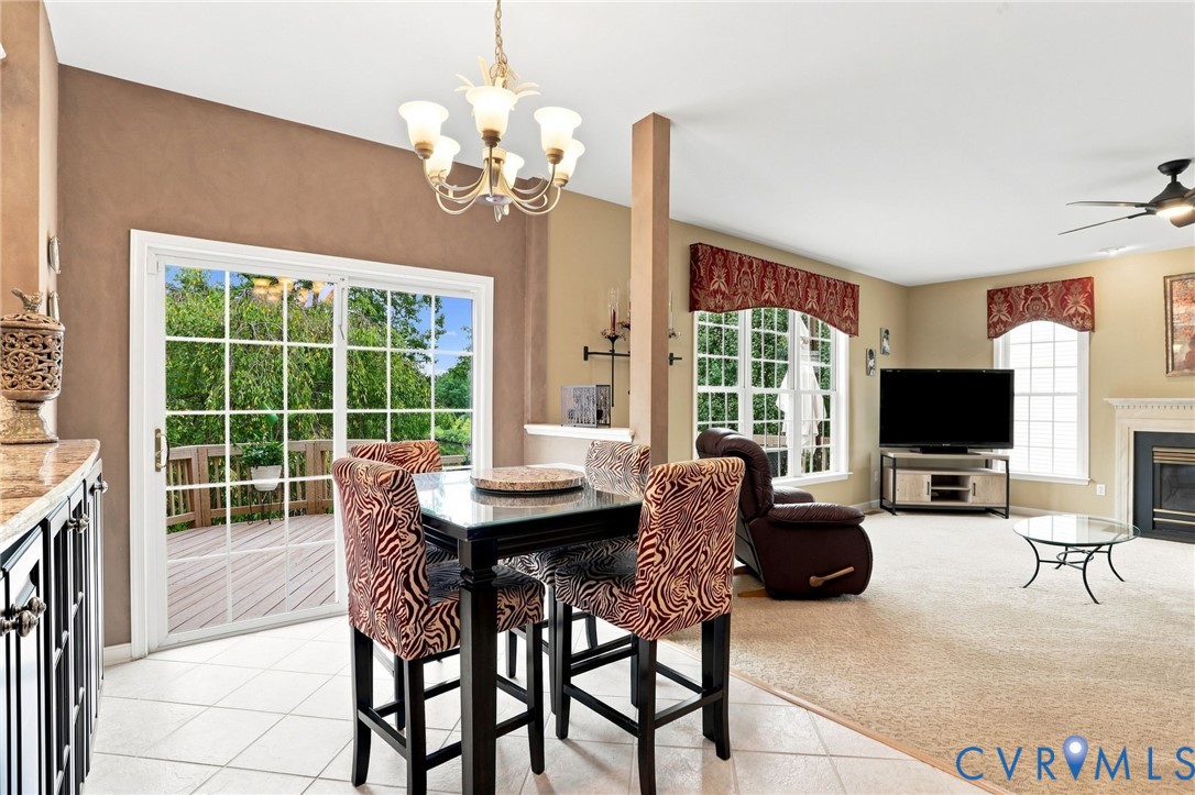 Bright eat-in area opens directly to the deck and flows seamlessly into the spacious family room.