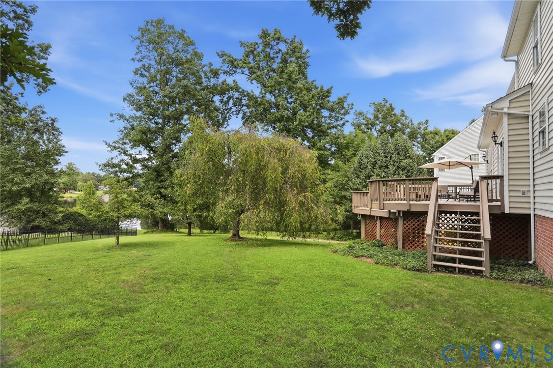 Generous backyard offers plenty of green space.