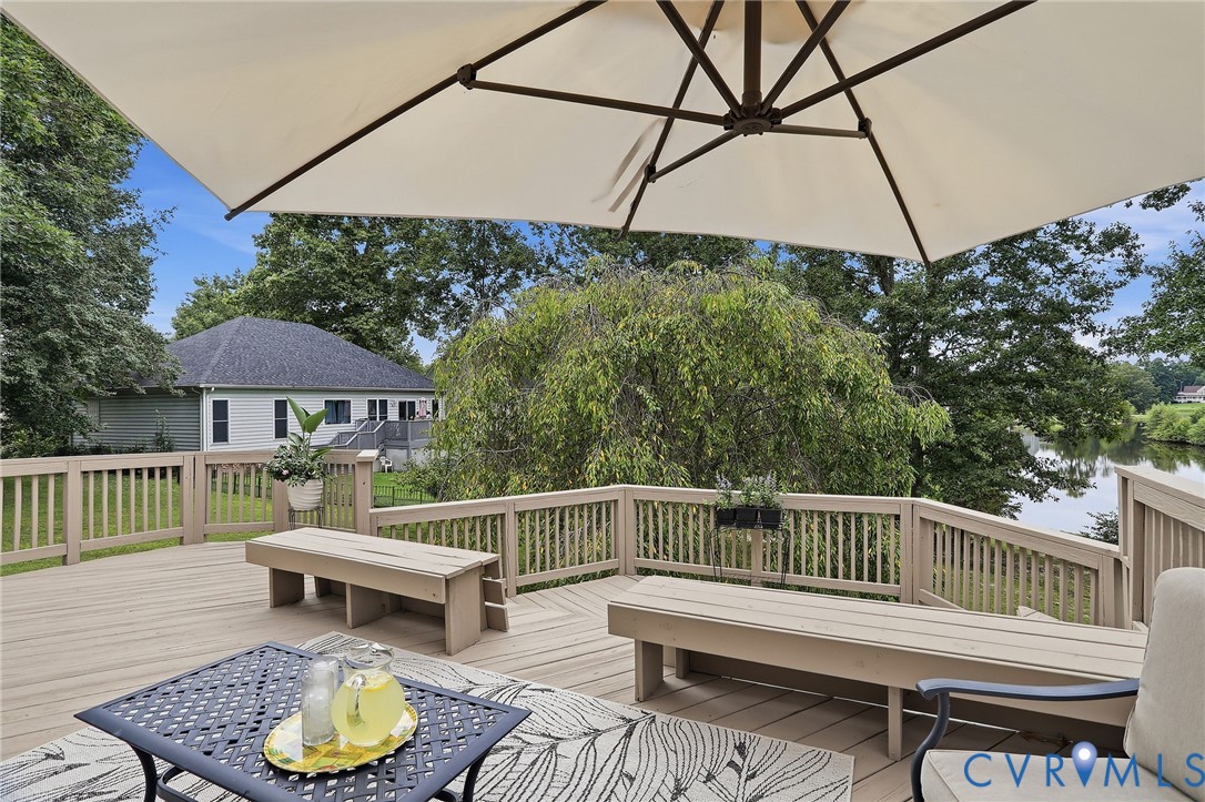 Enjoy tranquil pond views from the rear deckan inviting backdrop for relaxing or entertaining outdoors.