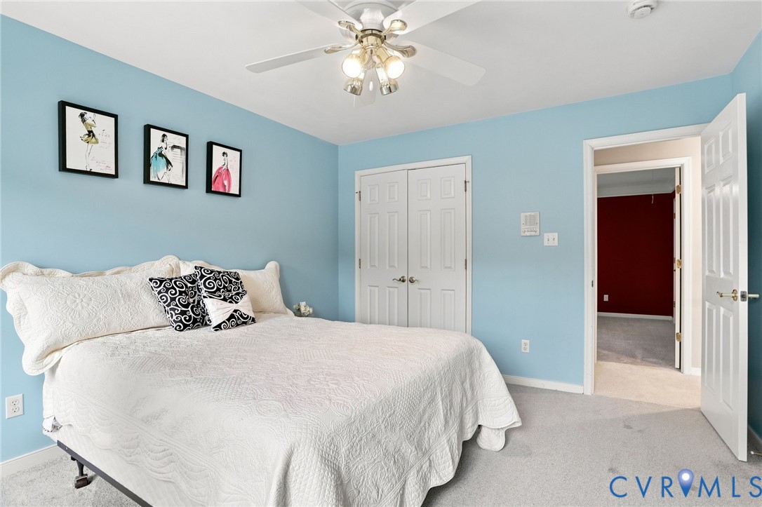 Additional view highlights the bedrooms spacious layout and double-door closet.