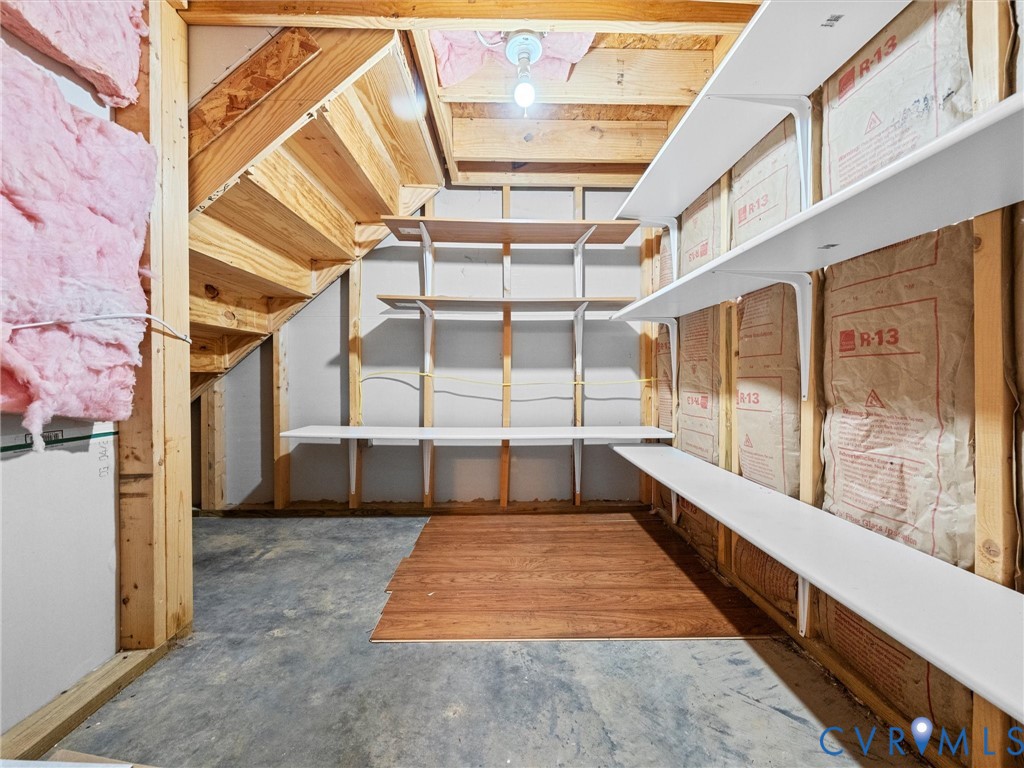 Additional Storage accessed through door in downstairs guest bathroom.