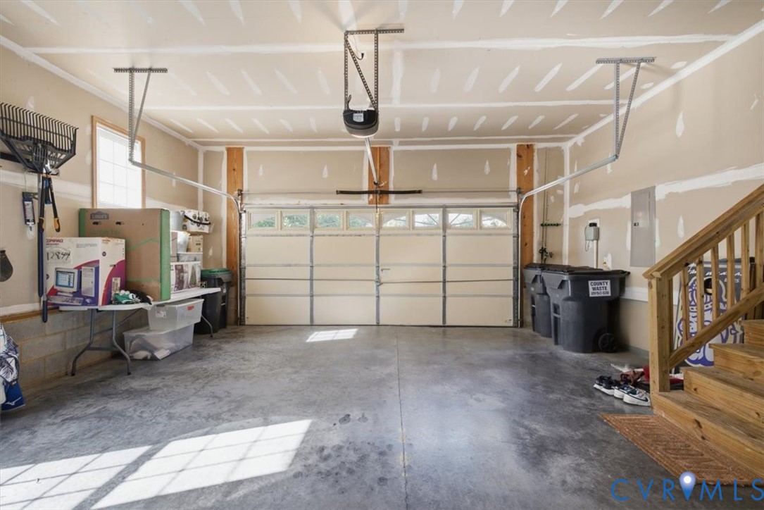 attached, direct entry from paved driveway.  Pedestrian door