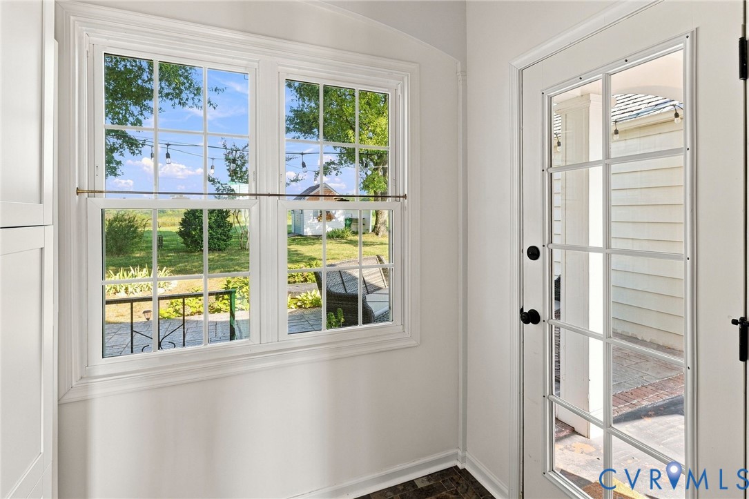 White paneled windows with detailed trim