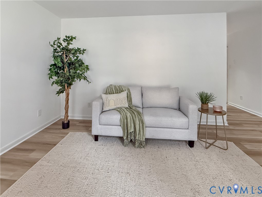 Light-toned wood-finish flooring complements crisp white walls Light-toned wood-finish flooring complements crisp white walls