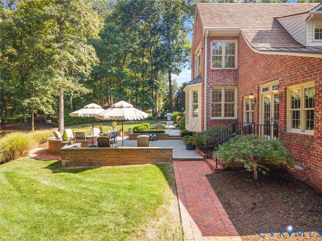 Brick exterior with multiple windows and bay window