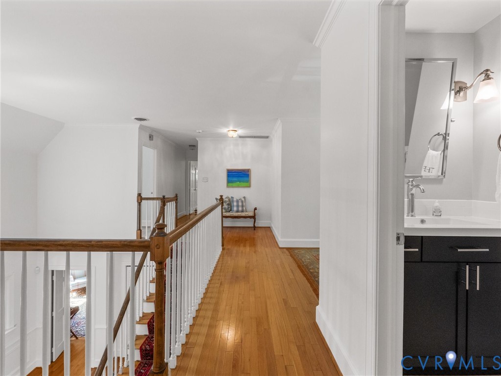 Hardwood flooring throughout the hallway