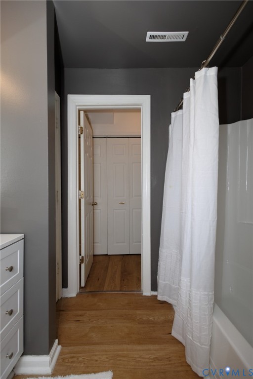 Hardwood-style flooring throughout