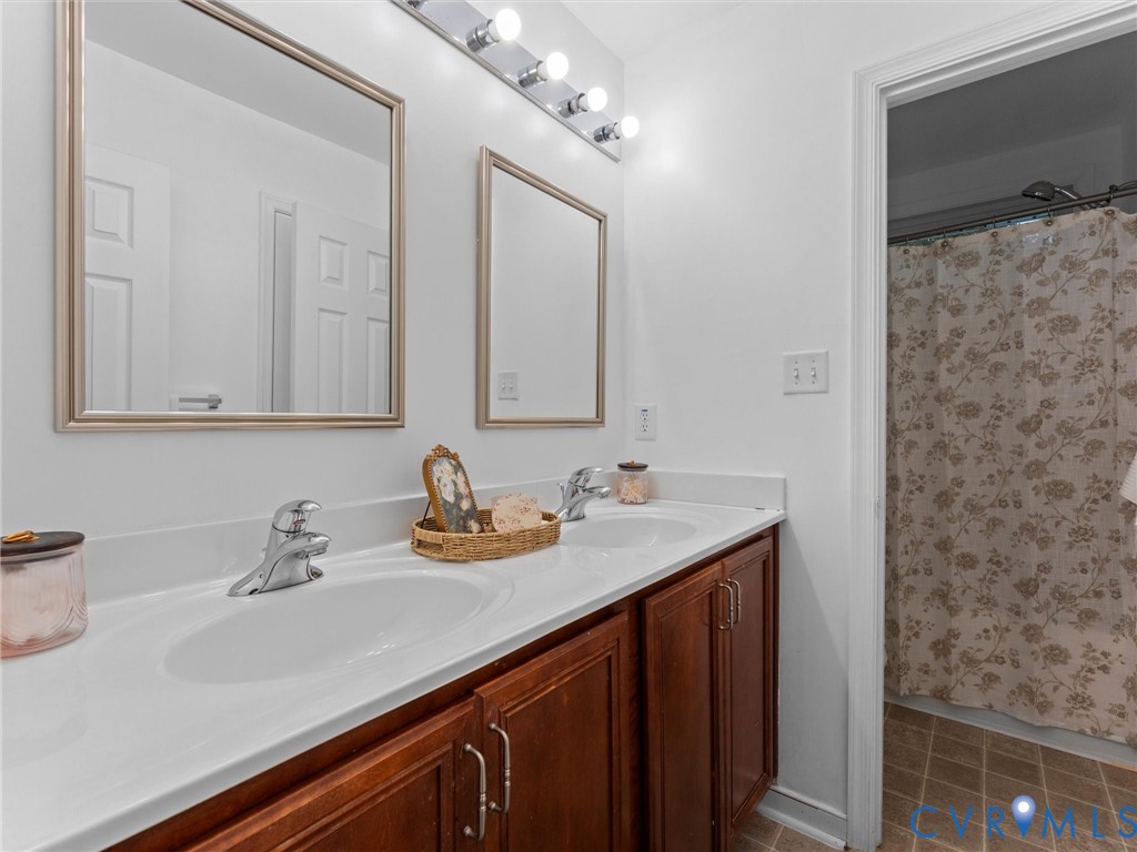 Double Vanity with 2 Sinks. Linen Closet. Private Area for Tub/Shower and Toilet.