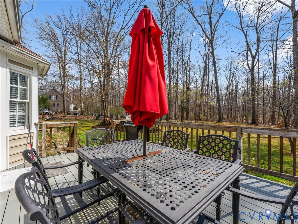 Expansive wood-finish deck with railing