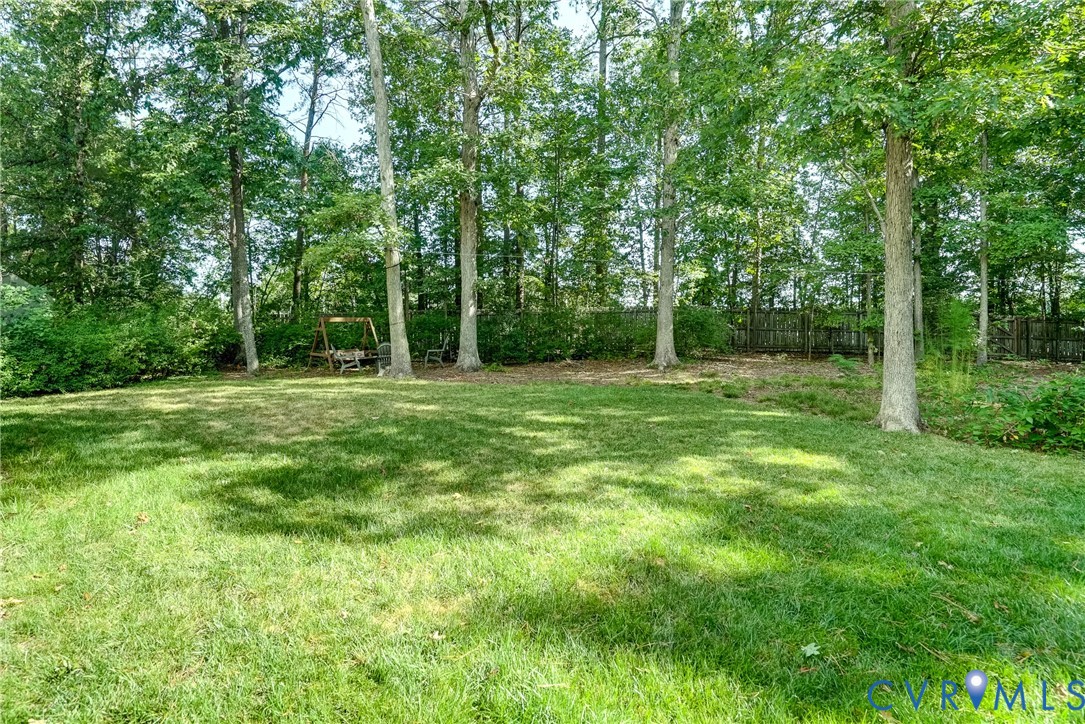 What a treat this yard is!  Over 1/2 acre, level, fenced in and access to Tuckahoe Little Leage Park!