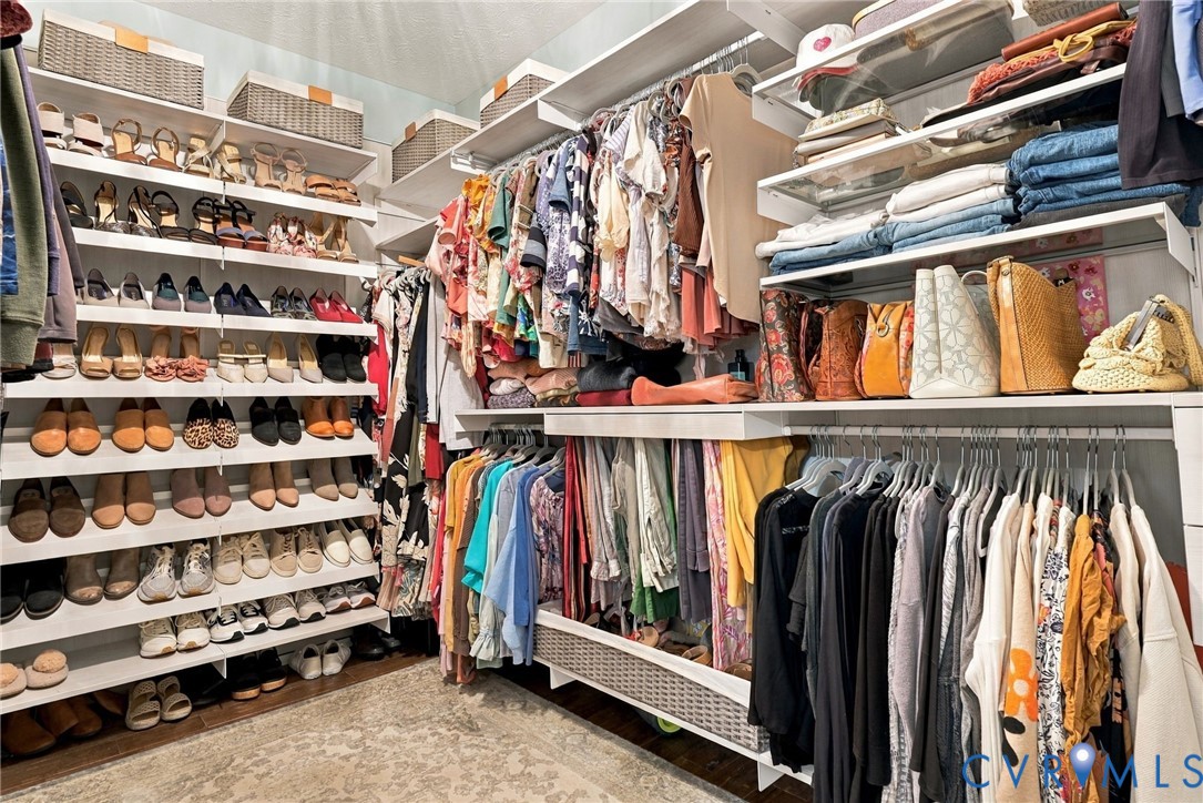 Built-in shelving and hanging rods for ample storage