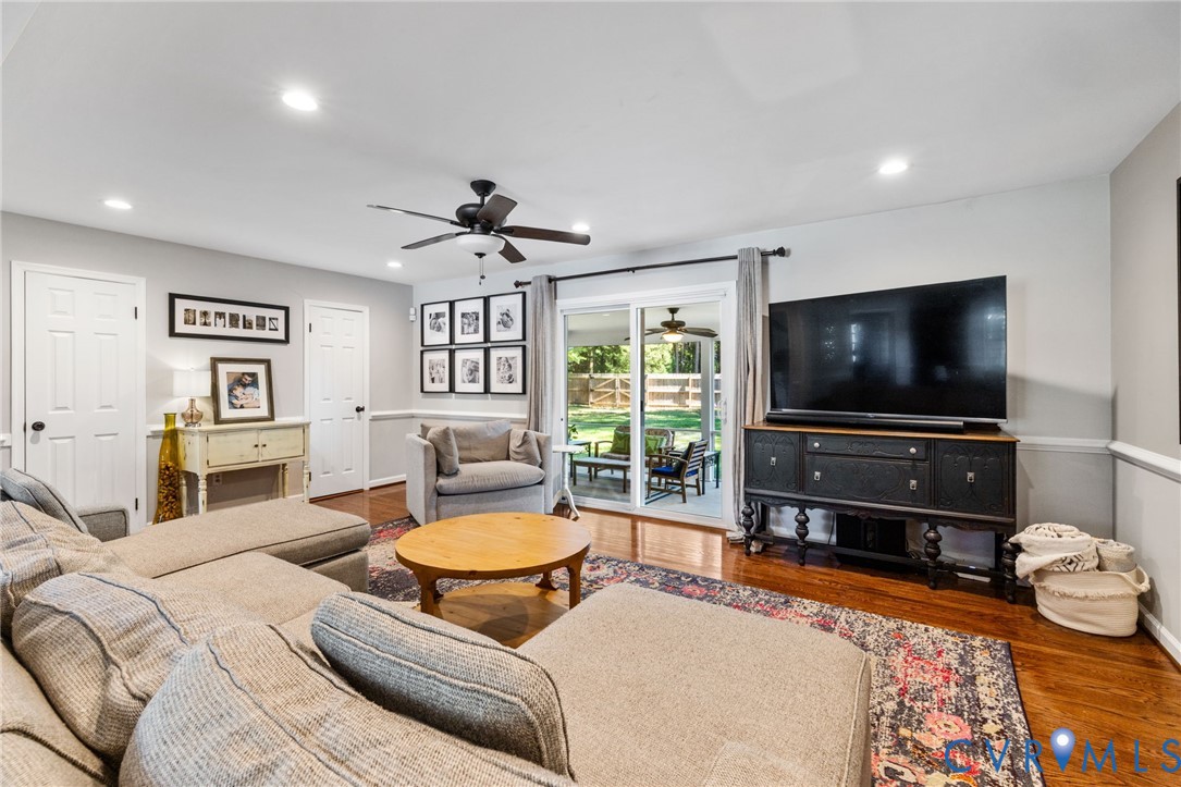 Hardwood flooring, recessed lighting, and a ceiling fan Hardwood flooring, recessed lighting, and a ceiling fan