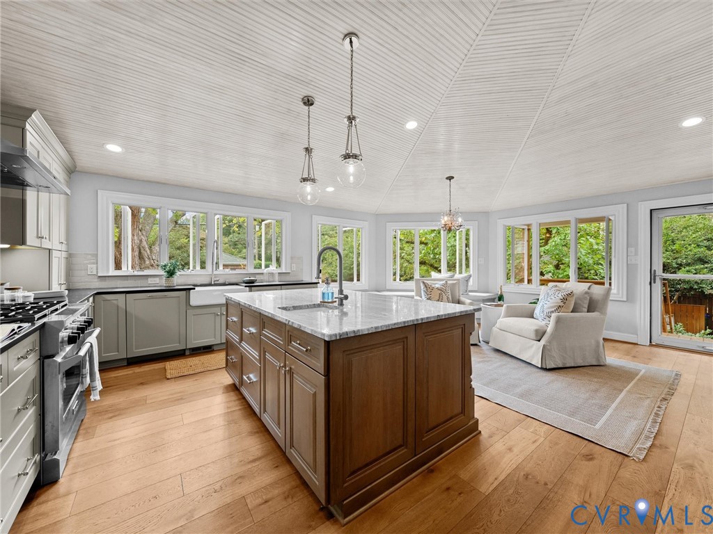 Windows open beautifully to expansive side yard!!