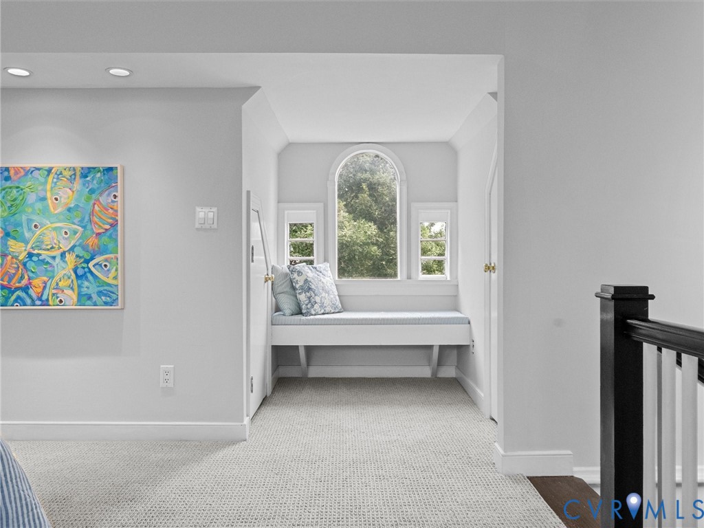 Third level bedroom with beautiful bench nook