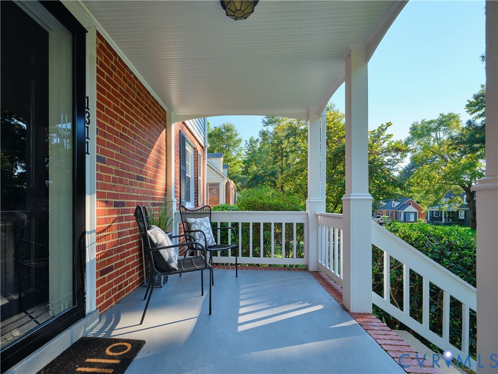 Relax on the covered porch with your morning coffee