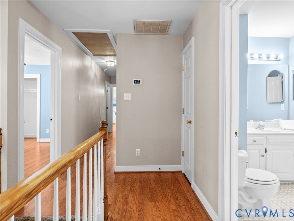 Hardwood-style flooring throughout the hallway