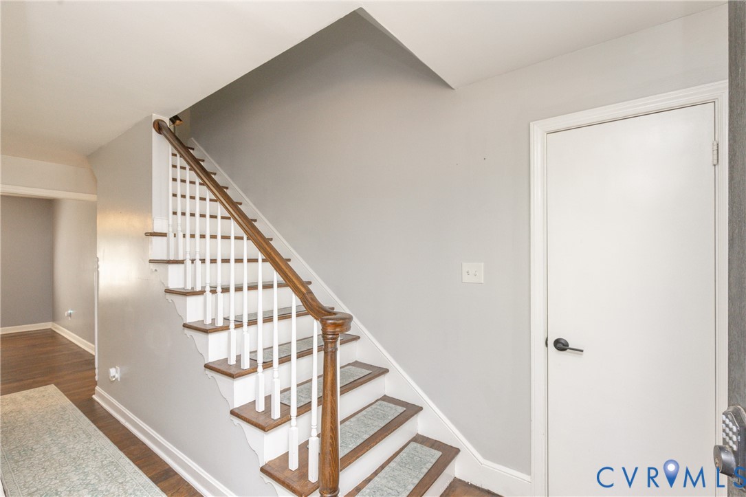 Wooden stairs leading upstairs