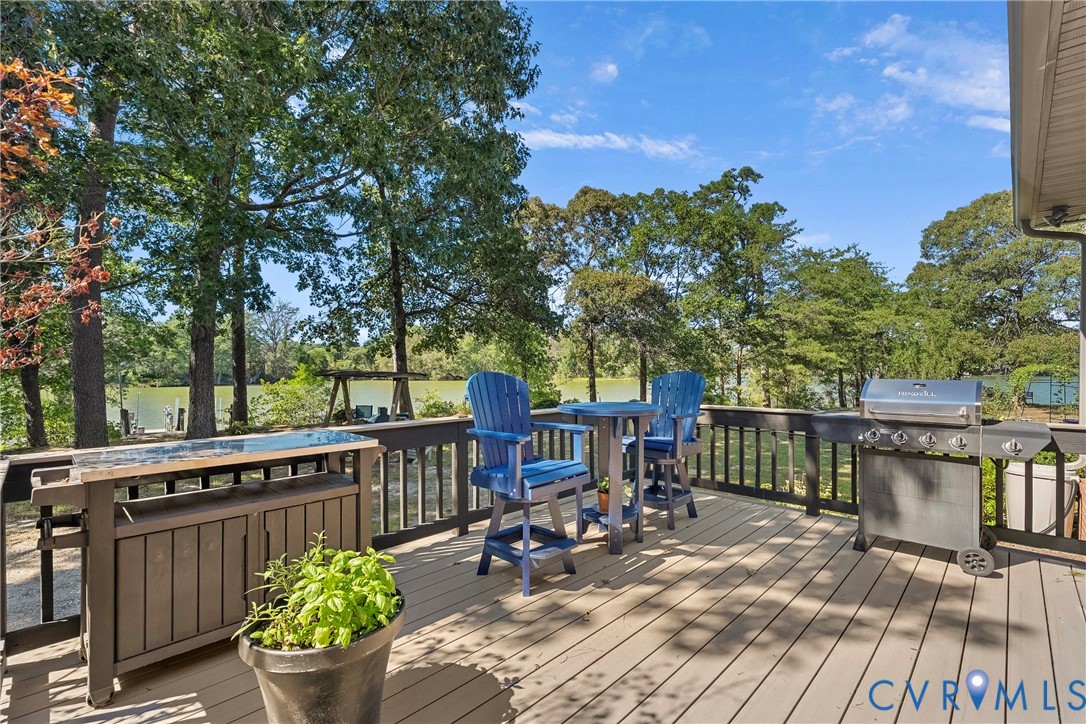 Expansive outdoor deck with composite decking and dark railings