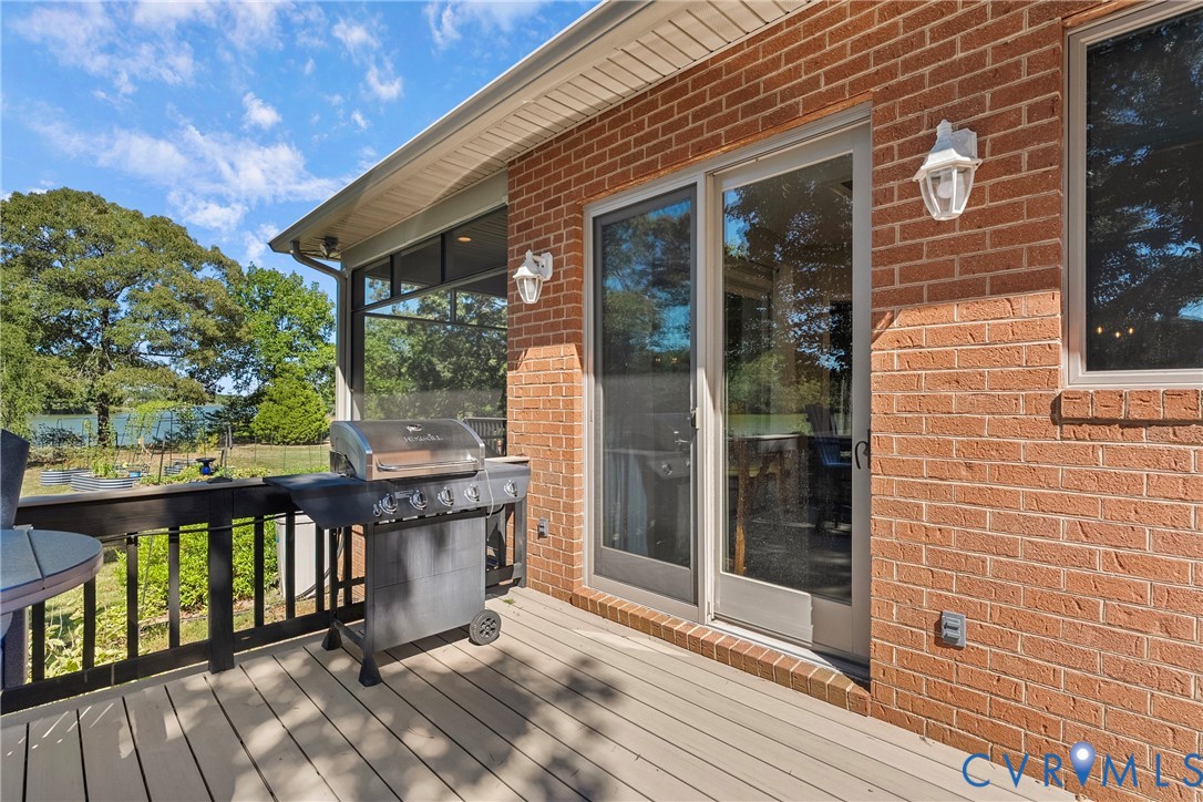Expansive outdoor deck featuring composite decking and a black railing system
