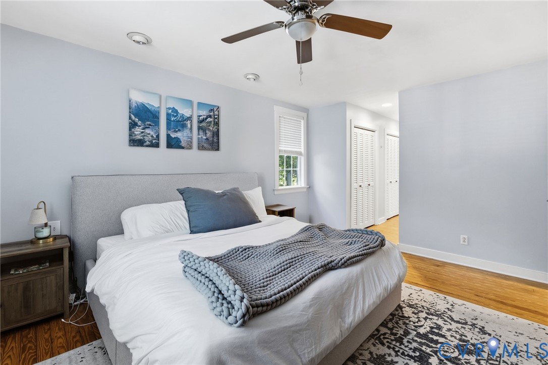 Wood-finish flooring, recessed lighting, and a ceiling fan