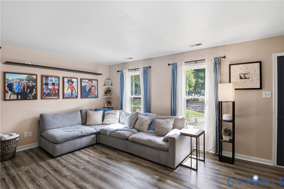 Wood-finish flooring throughout the space