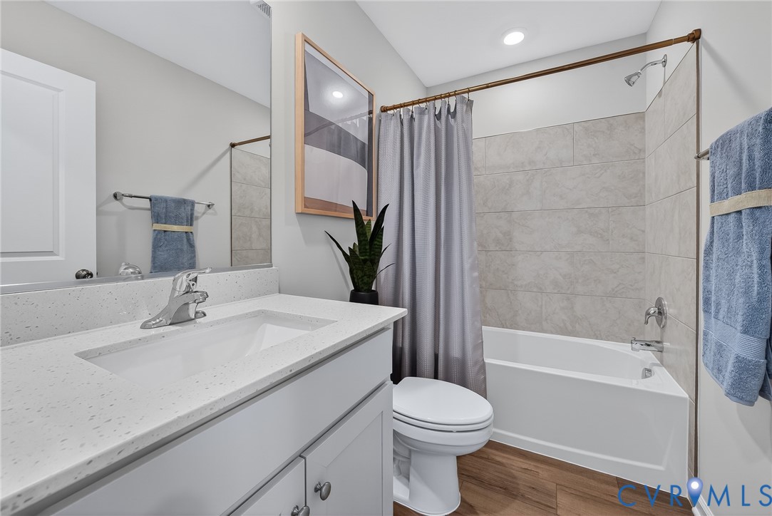 Vanity with integrated sink and chrome faucet