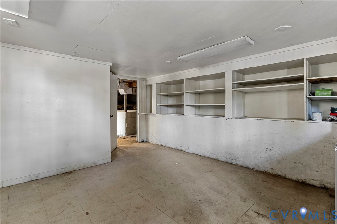 Basement, use to be a hair salon. Could make a great office, business, workshops, Has a half bath