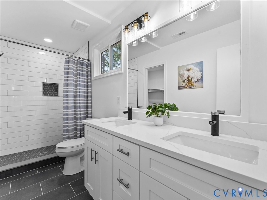 Dual vanity with integrated rectangular sinks and white countertops